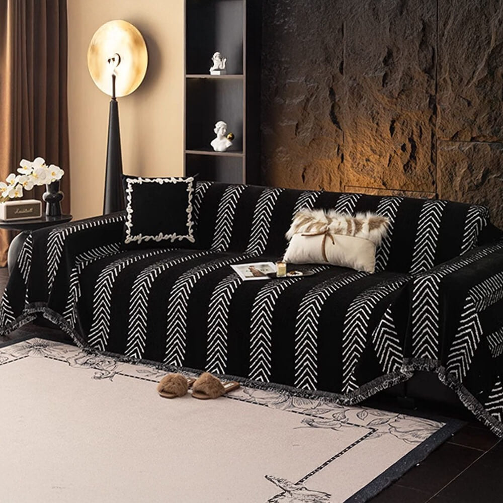 Chenille herringbone throw cover enhancing a sofa, providing comfort and pet-friendly defense