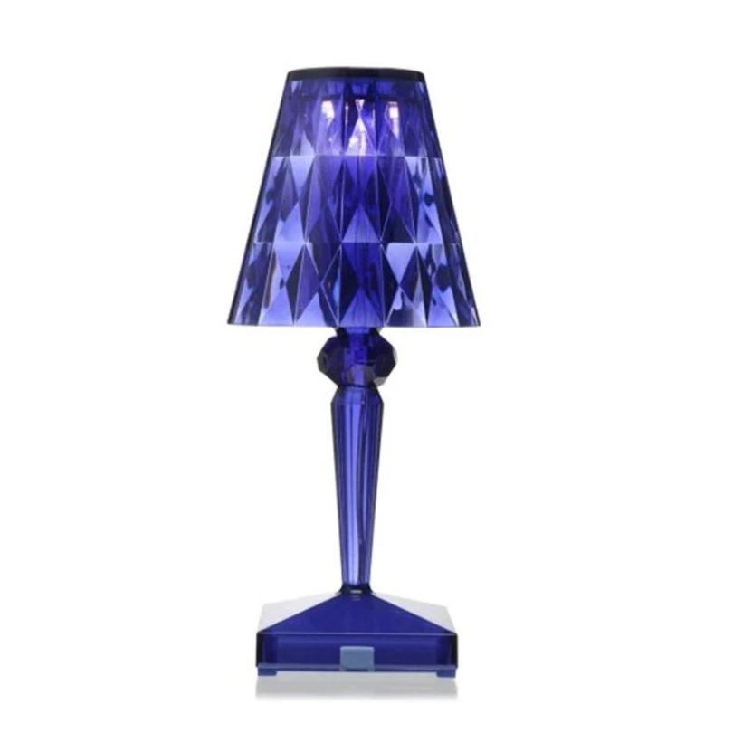 Decorative crystal table lamp, a chic addition to bedroom or living room decor.