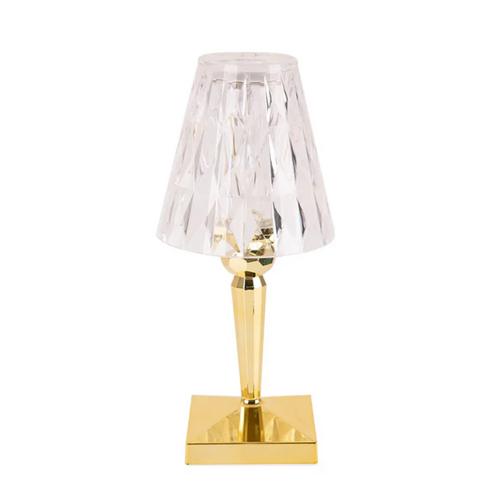 Modern crystal table lamp, providing ambient light for living room glam decor.