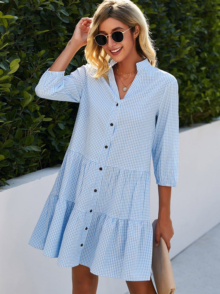 Chic women's blue lightweight mini dress, perfect for summer vacation. Effortless flowy style for casual elegance.