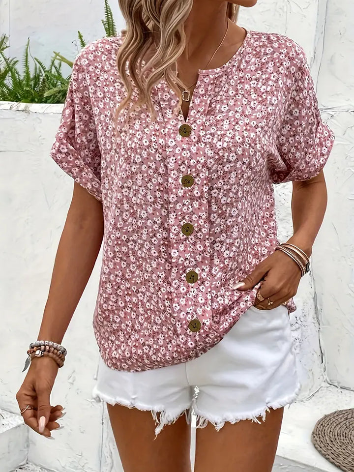 Floral print women's button-up blouse, chic and versatile long-sleeve top for casual or elegant spring/summer outfits.