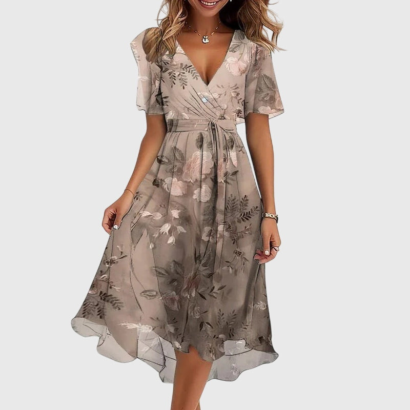 Comfortable women's midi dress with a chic, flowy design. Perfect as a summer day dress or elegant evening wear.