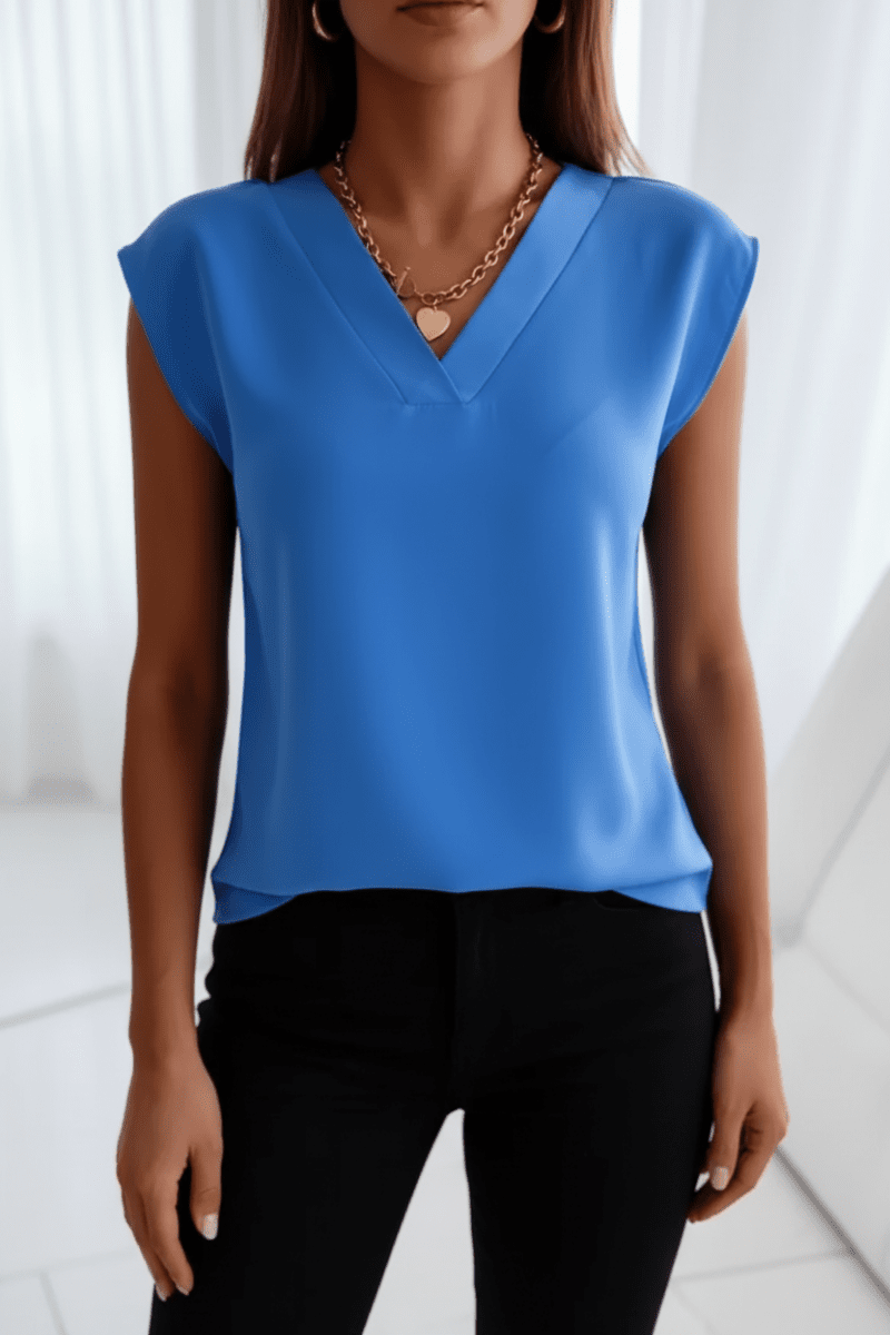 Chic women's open back going out top. Elegant sleeveless blouse perfect for summer nights & parties.