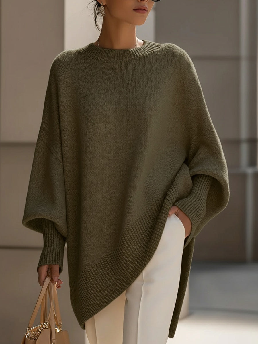 Women's stylish oversized sweater. Drop shoulder, comfortable, and versatile for everyday chic.