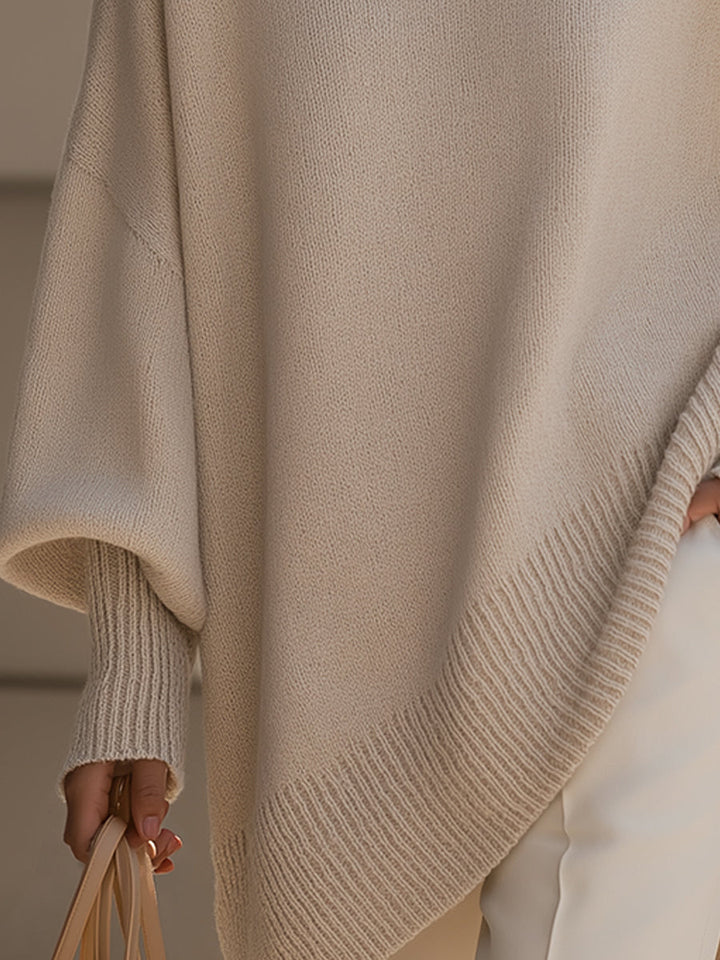 Women's drop shoulder oversized sweater. Chic, relaxed fit, versatile pullover for fall fashion.