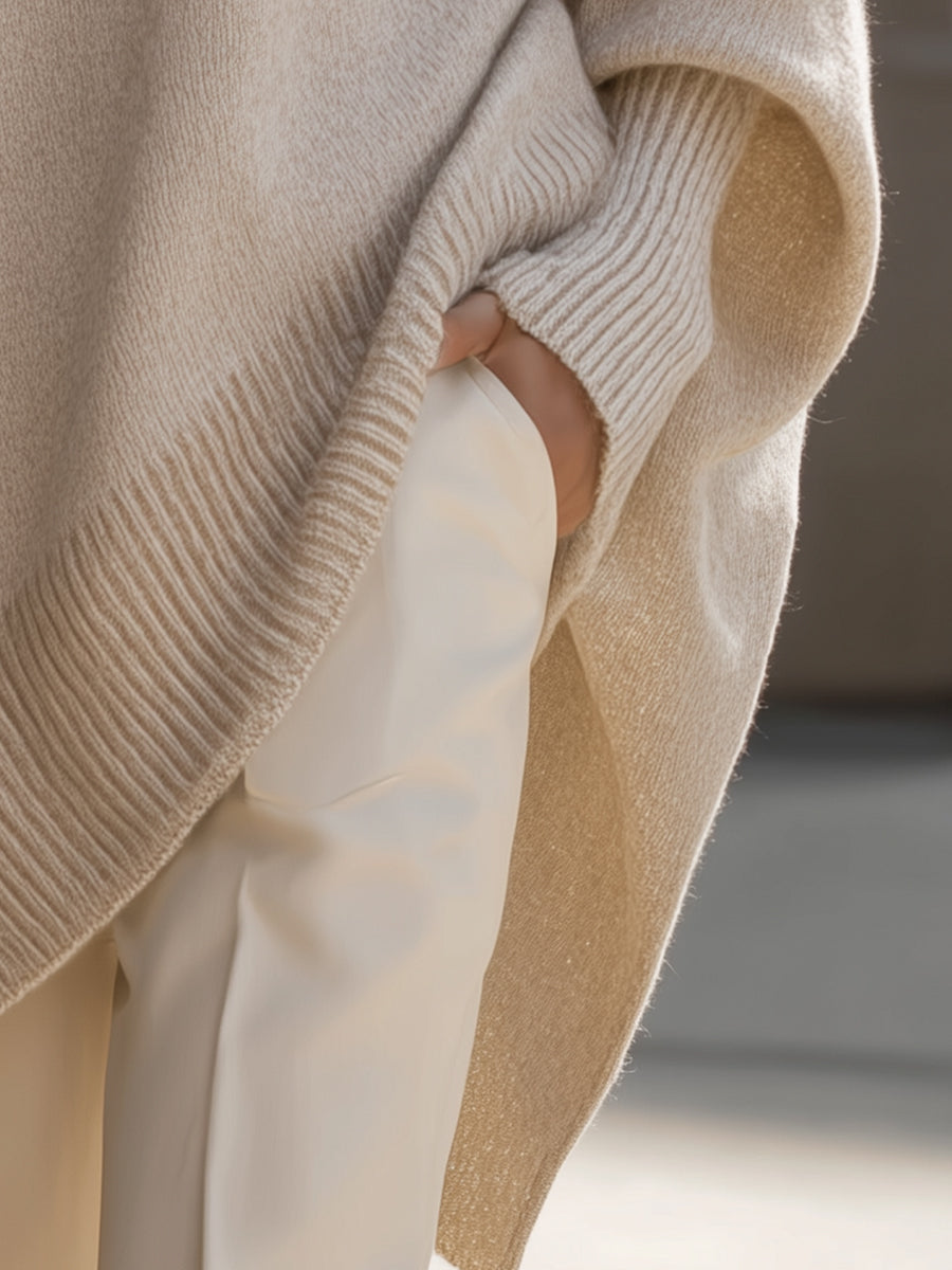 Sophisticated women's oversized sweater, chic knit for versatile everyday comfort & style.