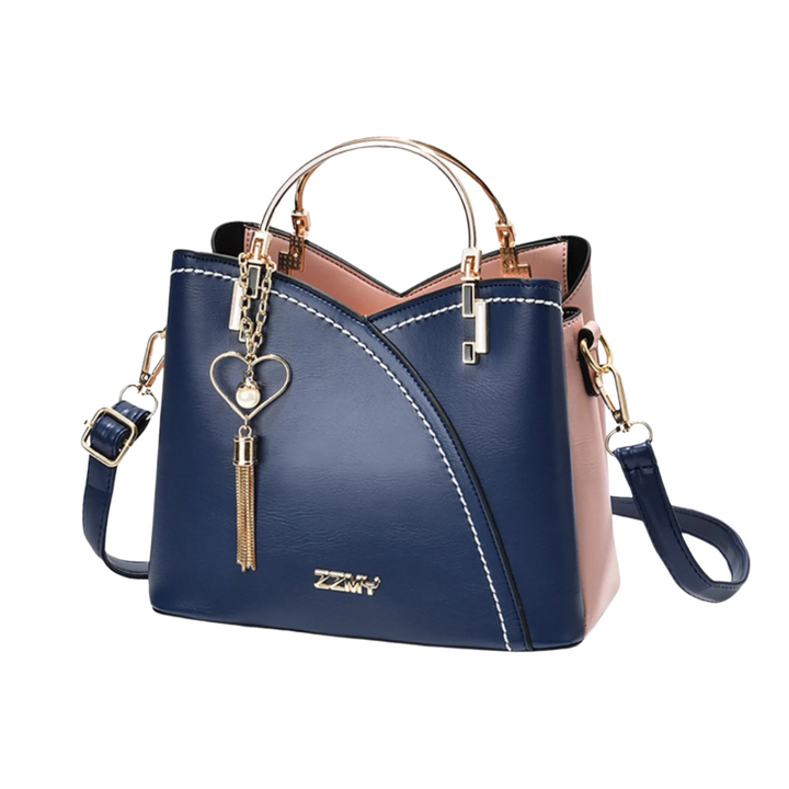 Elegant women's patchwork tote bag with designer quality and tassel charm, a stylish shoulder bag for daily fashion.