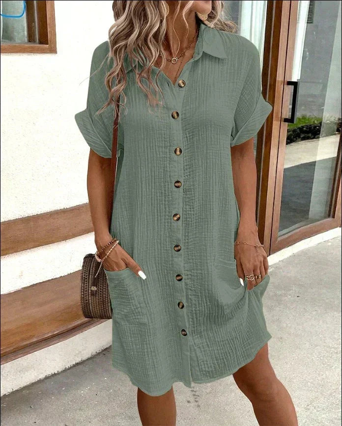 Relaxed fit women's polo mini dress, soft, short sleeve, chic button-down design for casual wear.