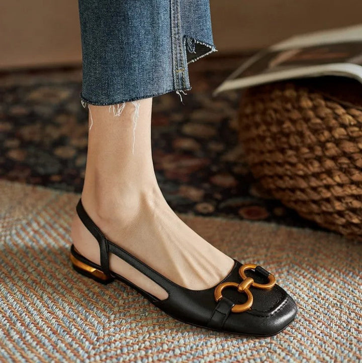 Dressy women's ergonomic slingback flats with gold detail, offering all-day comfort for office, casual, or evening wear.