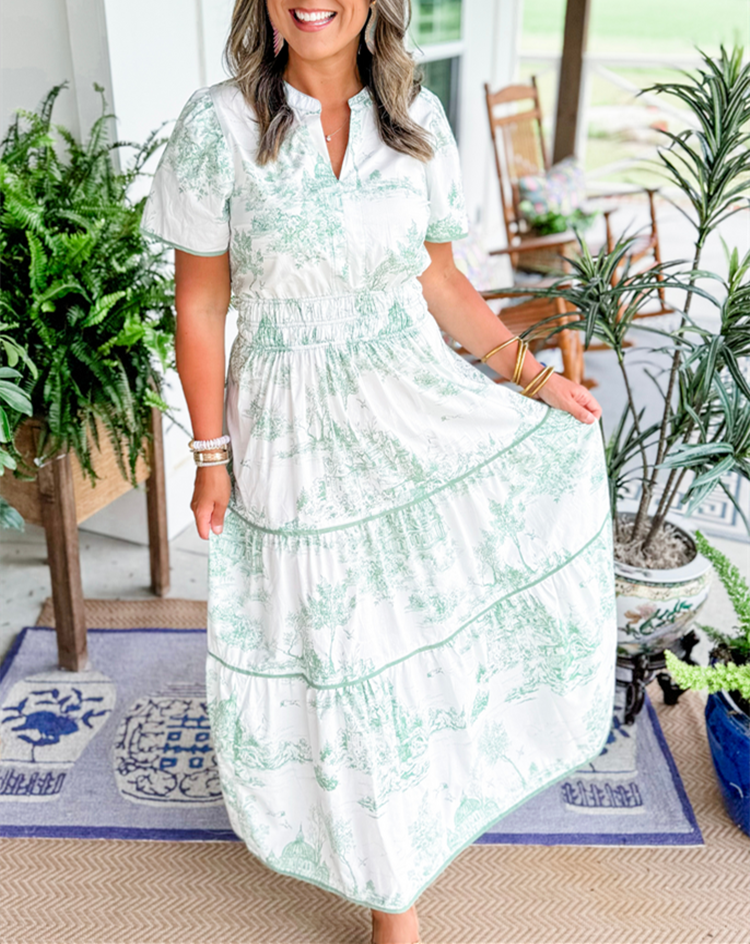 Elegant women's occasion wear: toile print tiered maxi dress with smocked waist & stylish puff sleeves.