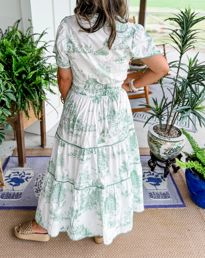 Puff sleeve tiered maxi dress for women, featuring a beautiful toile print; ideal for summer wedding guests.