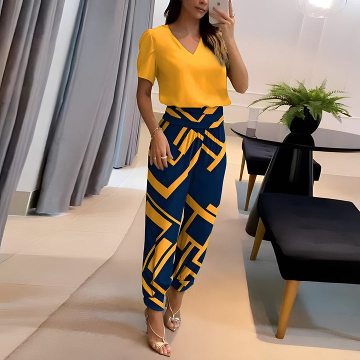 Chic women's two-piece set with a stylish v-neck blouse and comfortable pants, perfect for trendy casual wear.