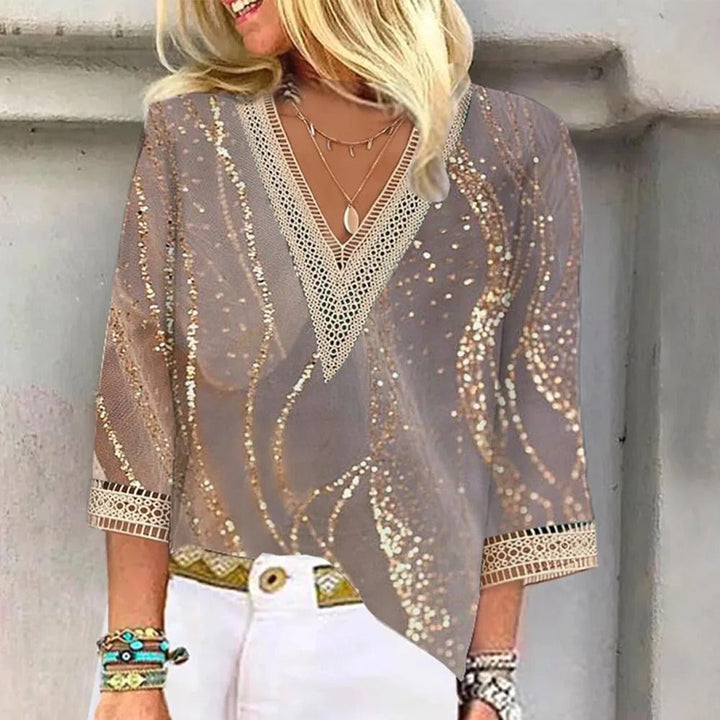 Elegant gold V-neck blouse for women. Versatile chic top, perfect for summer fashion & casual wear.