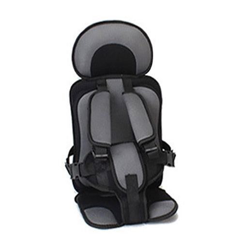 Durable kids' auto accessory: an adjustable car seat booster with safety harness for ultimate child protection.