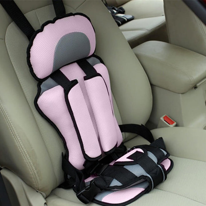 Versatile children's car seat booster, promoting child safety with a washable cover and secure harness.