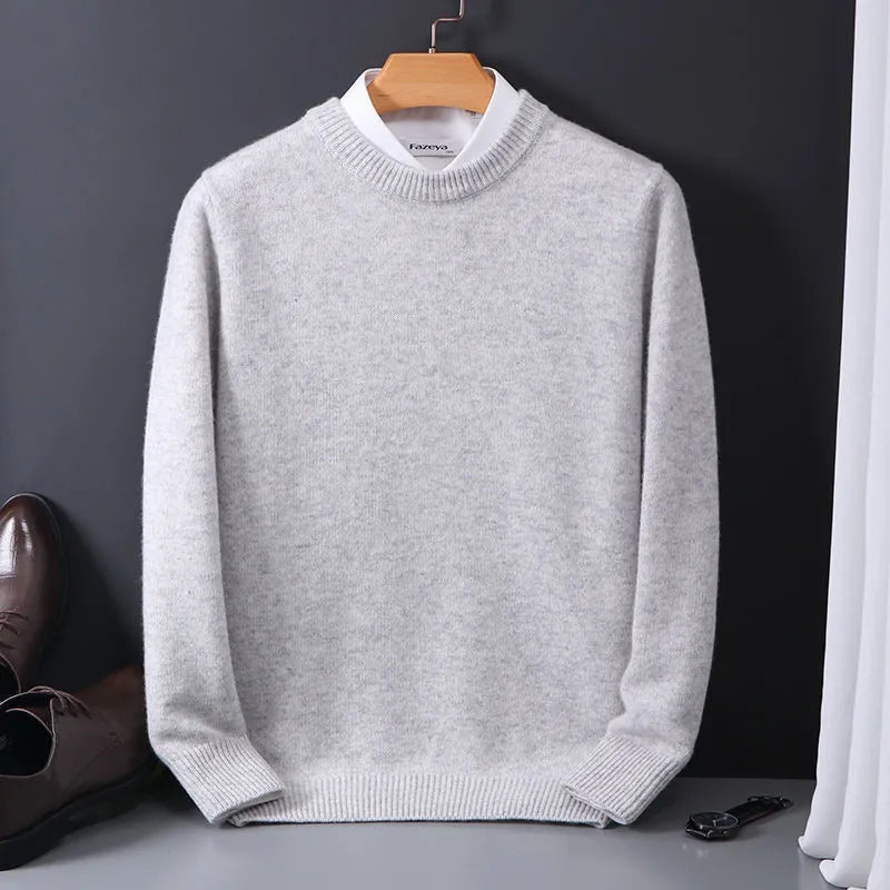 Elegant men's knit sweater with a crew neck, offering comfort and style for winter outfits.