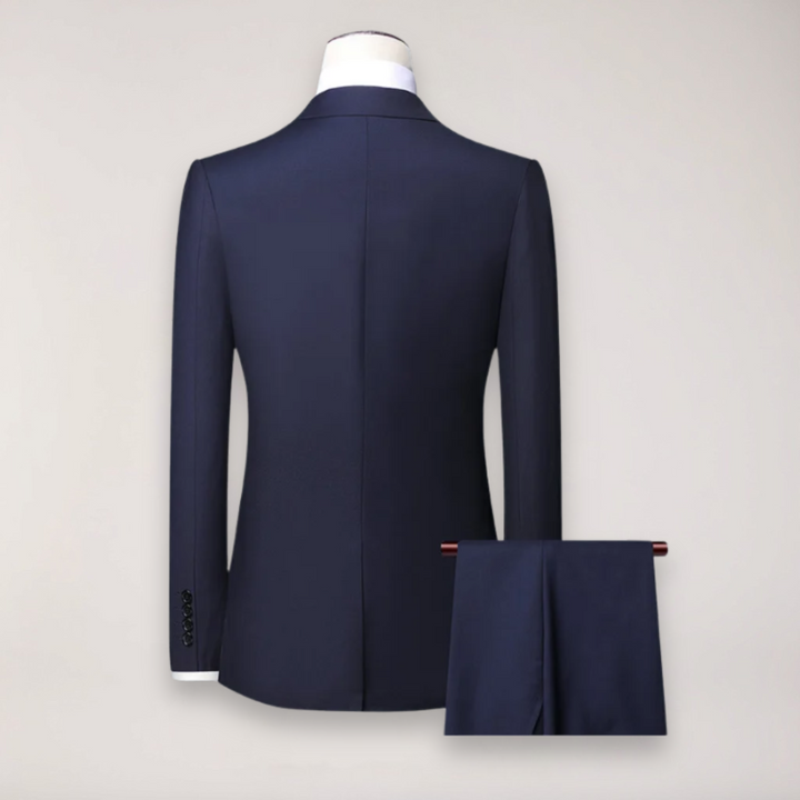 Elegant men's three-piece wedding suit, perfect for formal events. Includes jacket, vest, trousers.