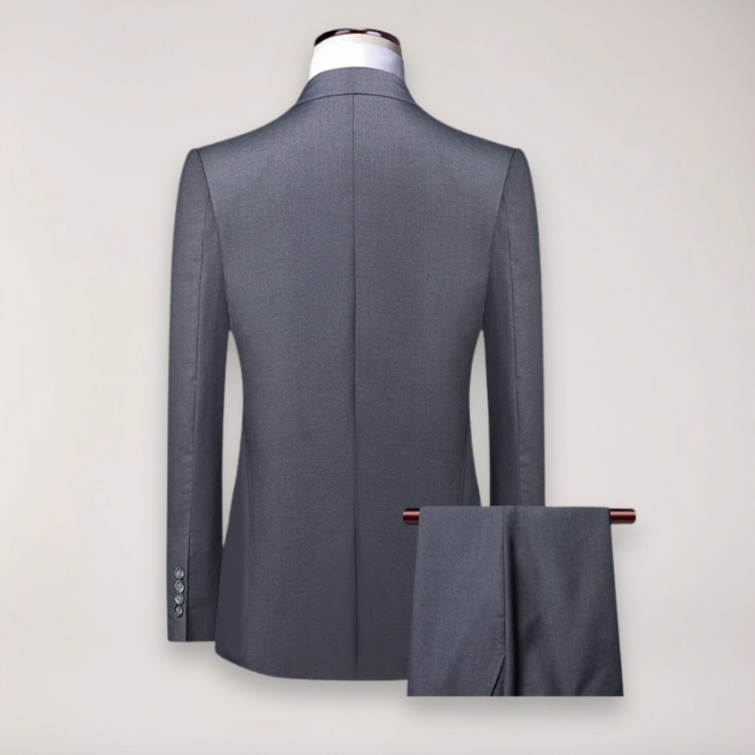 Sophisticated men's three-piece wedding suit. High-quality tailored formal suit for events.