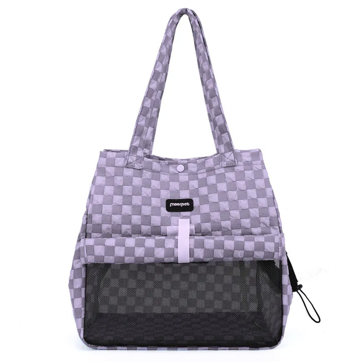 Small dog carrier for cars with breathable mesh, ensuring pet comfort during travel