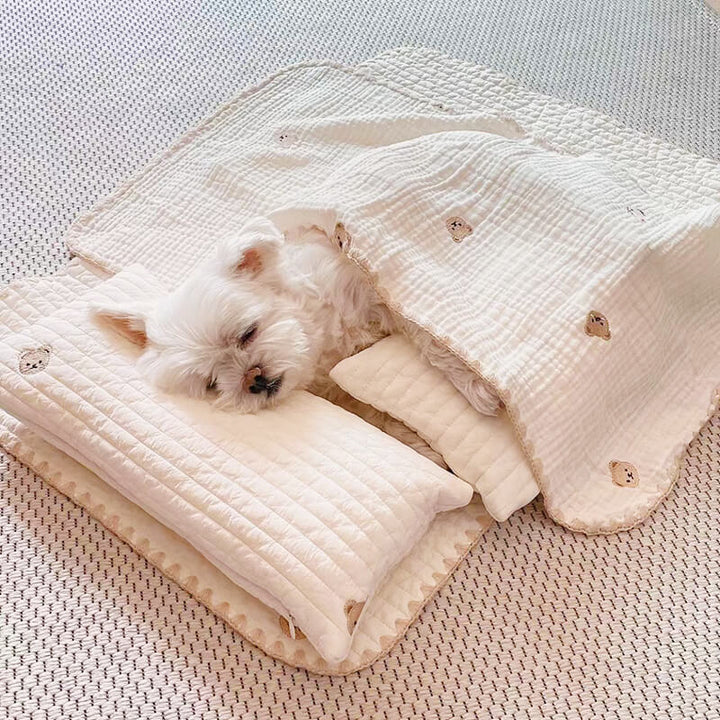 Embroidered animal pet bedding ensemble, including a dog bed, pillow, and matching quilt