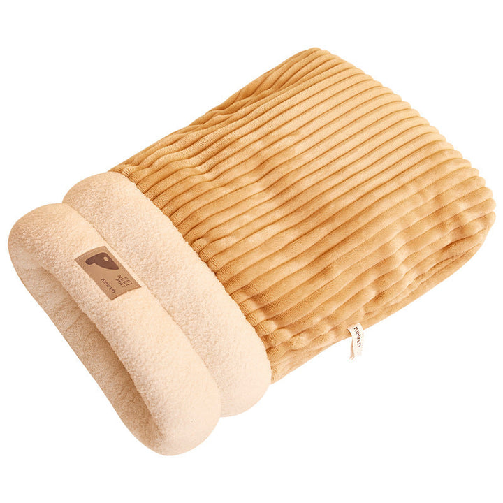 Cat sleeping bag with a cat peeking out, illustrating cozy pet bed cavern comfort and design
