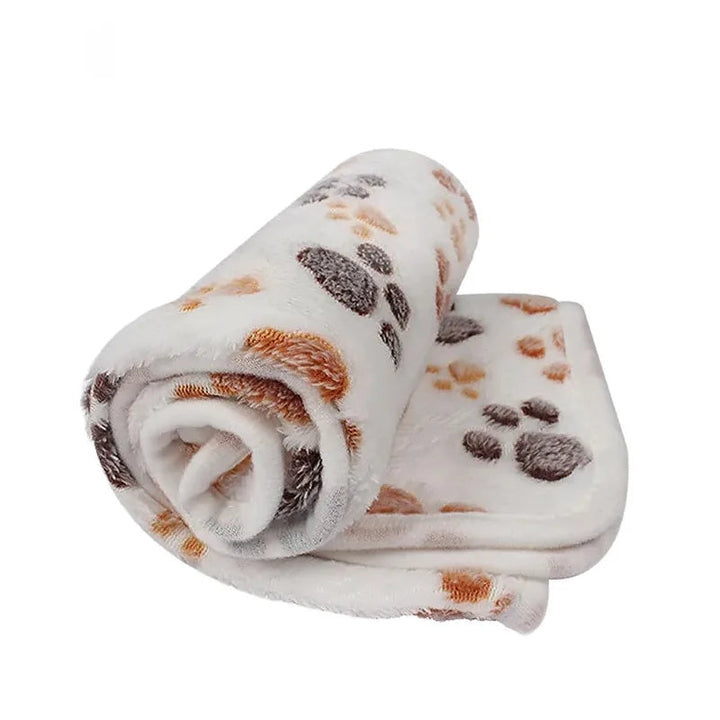 Warm and fuzzy coral fleece blanket designed for pet comfort, a great dog or cat blanket accessory.