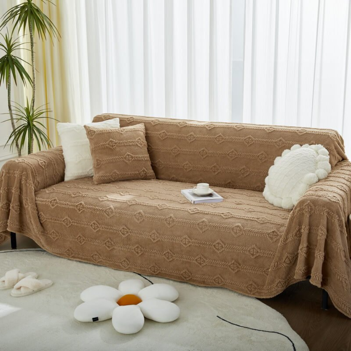 Luxurious faux fur sofa slipcover, soft to the touch, adding warmth and elegance to living room decor.