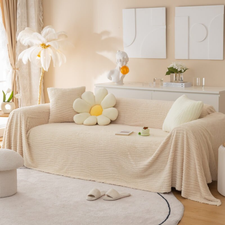 Elegant faux fur furniture slipcover, transforming a sofa with its plush texture and protecting it from daily wear.