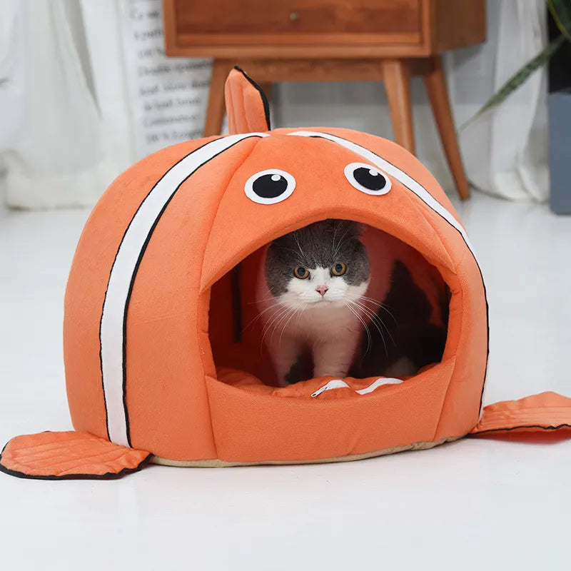 Comfortable cat bed with unique fish shape, perfect for a cozy pet hideaway