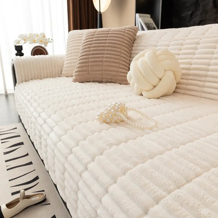 Machine washable flannel sofa protector, easy to care for in pet-friendly households.
