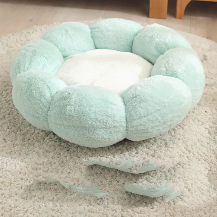 Soft and cozy flower basket cat bed, an inviting pet sleeping cave with decorative petals.