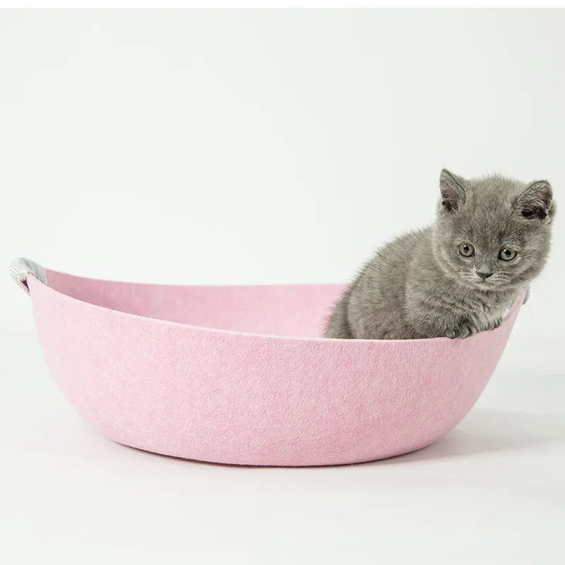 Portable cat bed made from durable light grey felt, perfect for feline accessories and pet comfort.