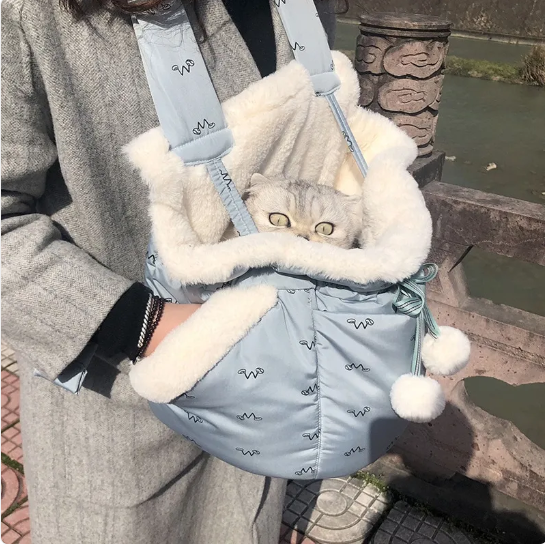 Cozy Pet Retreat Bag: fleece-lined car cat bed for warm, comfortable travel.