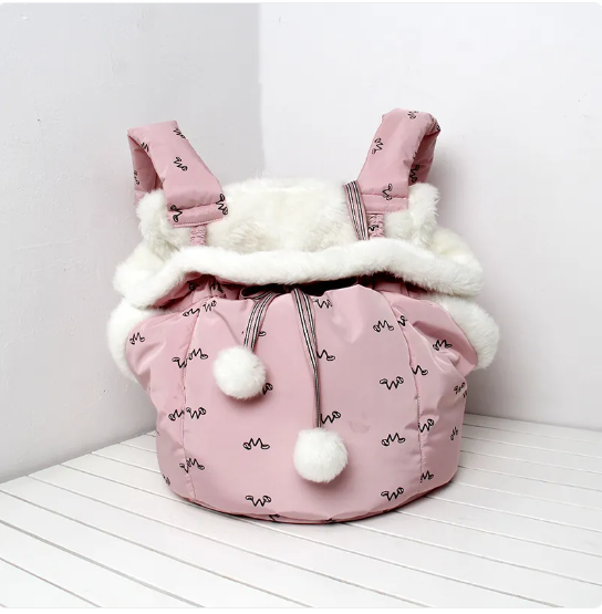 Cat furniture for travel: Cozy Pet Retreat Bag, a warm, fleece-lined pet bed.