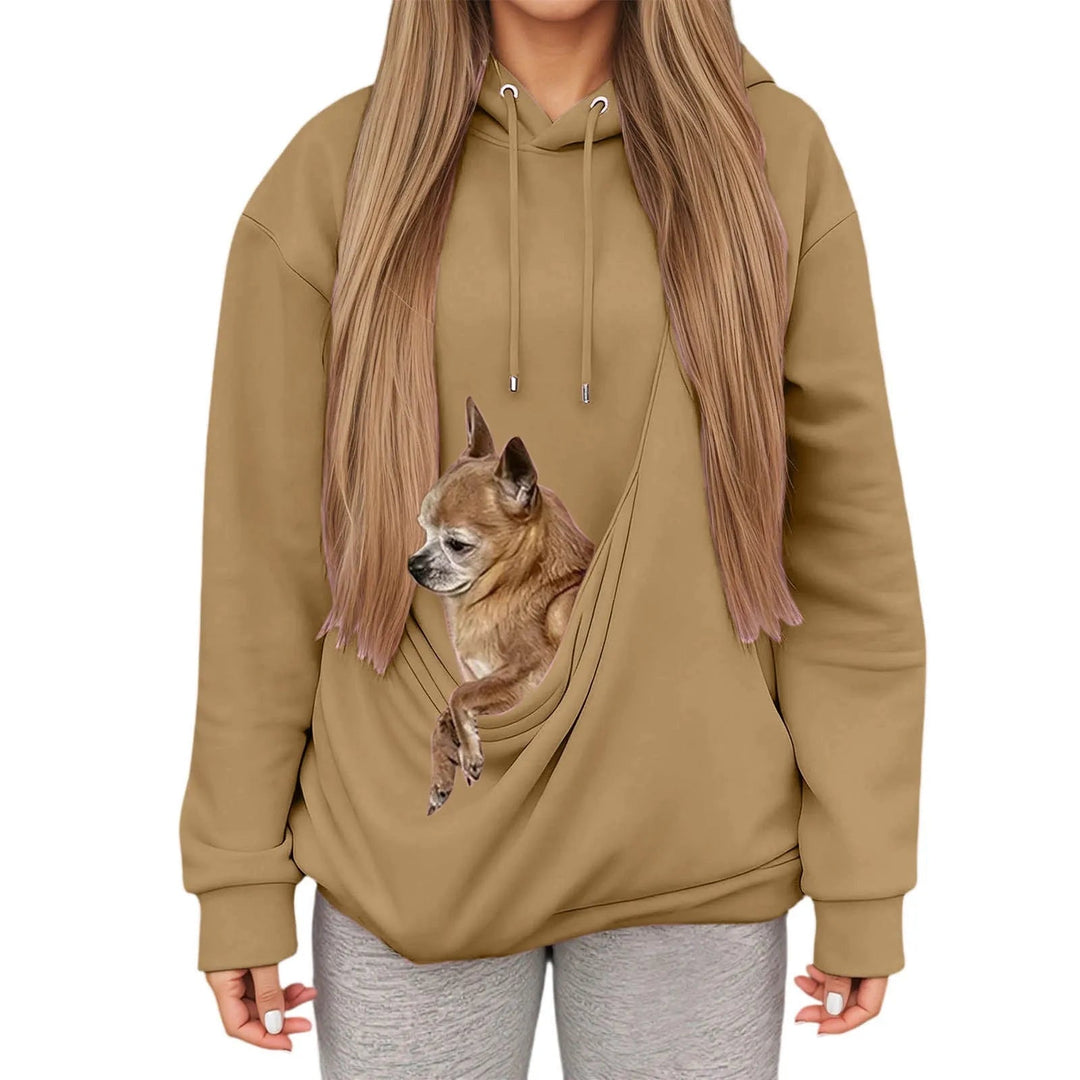 Relaxed fit pet owner hoodie for women, soft fabric and convenient pet carrying pouch.