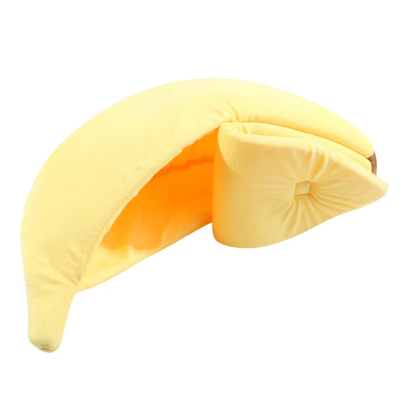Soft banana pet bed promoting deep sleep for cats and small canine companions.