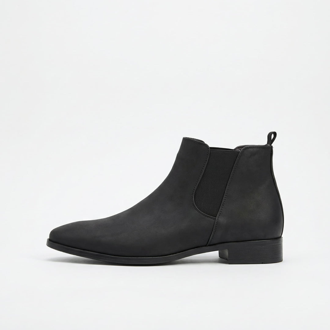 Close-up of Men's Stratton brown suede Chelsea boots, featuring elastic goring and pull tab.