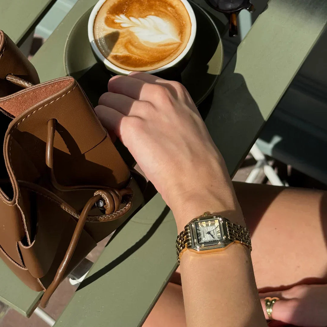 "Damen Armbanduhr aus 18k Gold, elegantes Design, präzises Quarzwerk, luxuriöses Schmuckstück, zeitlose Eleganz"