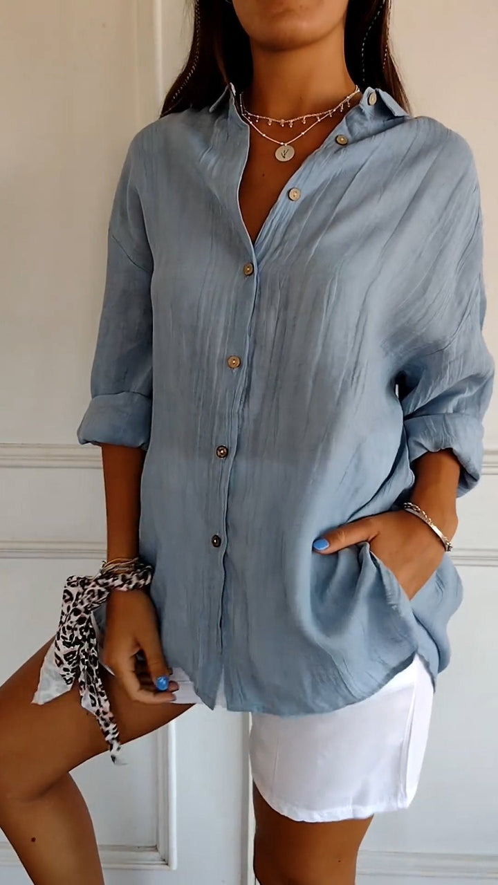 Damen Button-Down Hemd, leicht und atmungsaktiv, weiß, perfekt für Sommer, vielseitiges Styling mit Röcken oder Jeans.