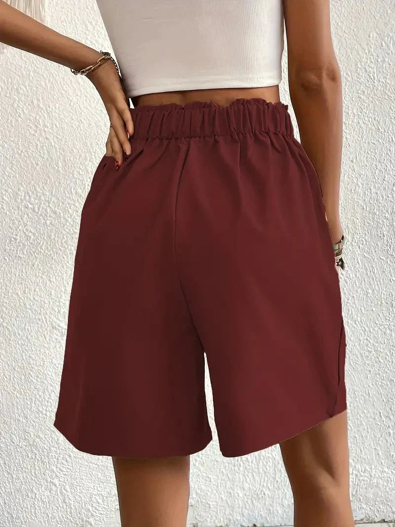 "Damen High Waist Shorts aus Leinen mit schrägen Taschen, elegante Passform, ideal für Sommerkleidung, hintere Ansicht"