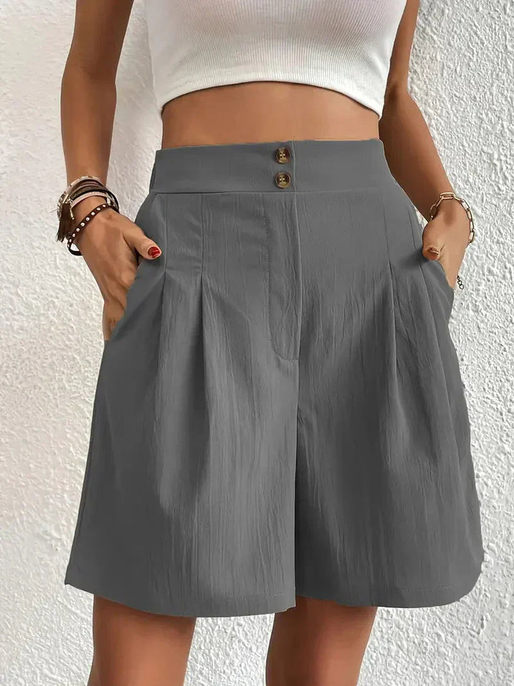 "Damen High Waist Shorts aus Leinen mit schrägen Taschen, elegante Passform, ideal für Sommerkleidung, hintere Ansicht"