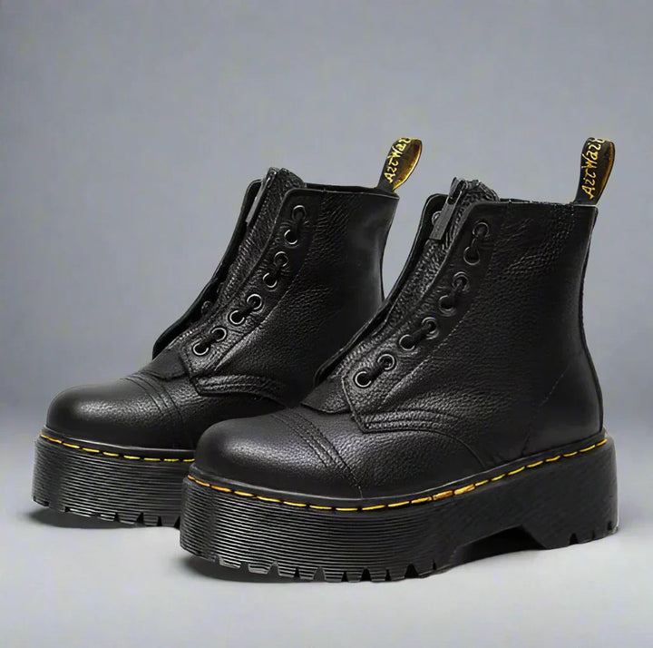 "Damen Schnürstiefel aus schwarzem Leder, elegant und robust, mit klassischem Design, ideal zu jedem Outfit."