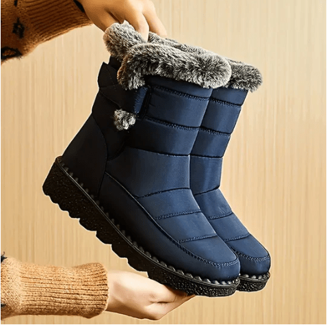 "Damen winterfeste Stiefel, wasserdicht, schwarz, mit rutschfester Sohle, für zuverlässigen Halt und elegantes Design."