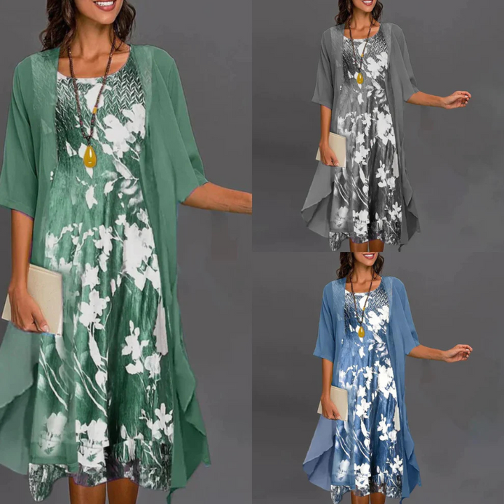 "Damenkleid mit Blumenmuster, Mini, ergänzt durch eleganten Blazer, ideal für stilvolle Anlässe und feminine Eleganz."