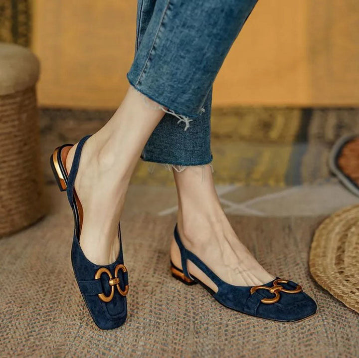 Dark blue women's sandals with adjustable straps & cushioned footbed for ultimate comfort.