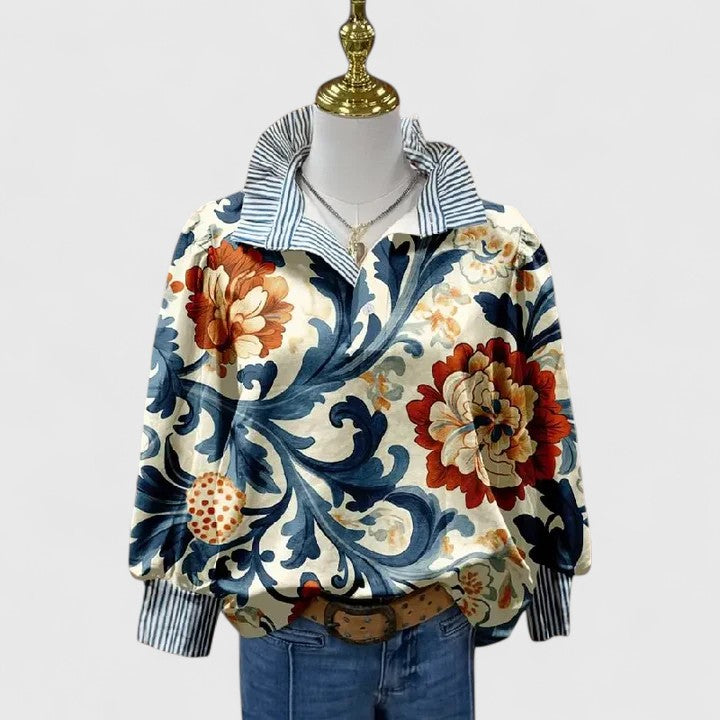 Dark blue women's stylish floral blouse. Elegant top with a comfortable fit, perfect for any occasion.