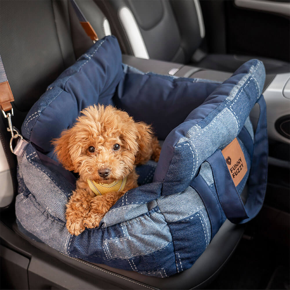 Denim dog car seat booster with safety bolster, comfortable pet travel accessory for small dogs.