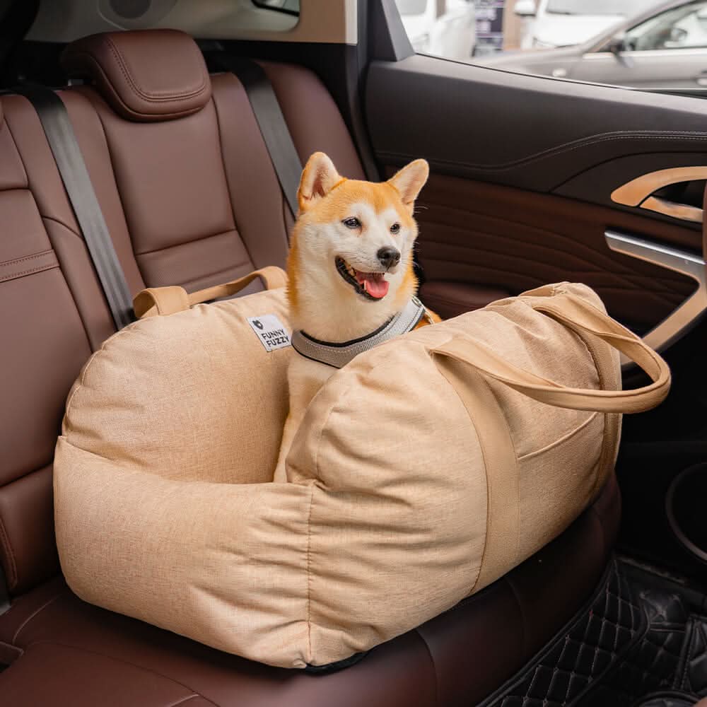 Front view of a dog car booster seat highlighting the safety belt and non-slip base.