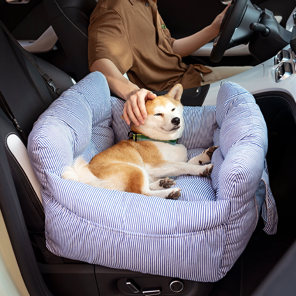 Travel safety pet car seat, secures pet into place, minimizes motion.