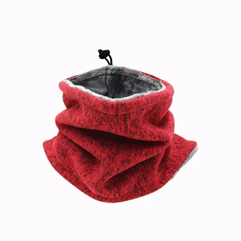 Dog in a windproof fleece balaclava engaging in outdoor winter play, pet sports accessory